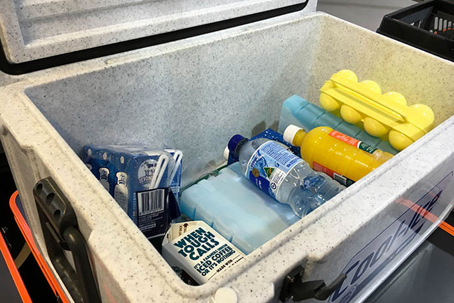 Ice blocks and bottles in a waeco cooler