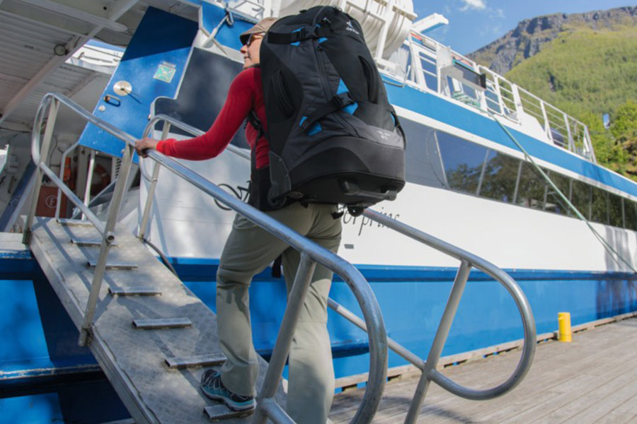 Woman carrying Deuter Travel Pack