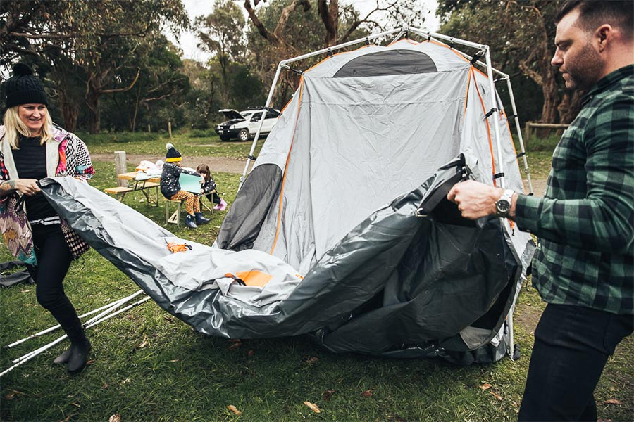 Setting up a tent as a family