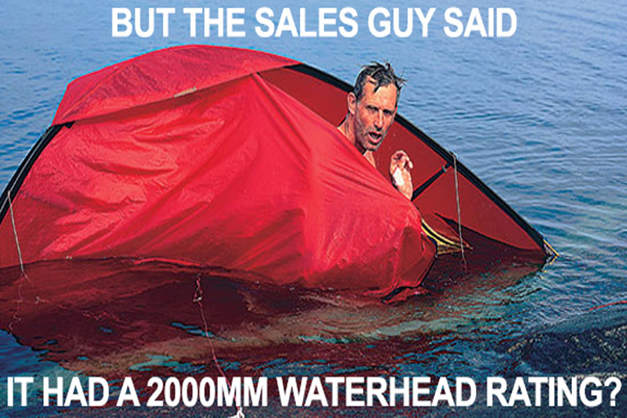 Man in tent floating away in water