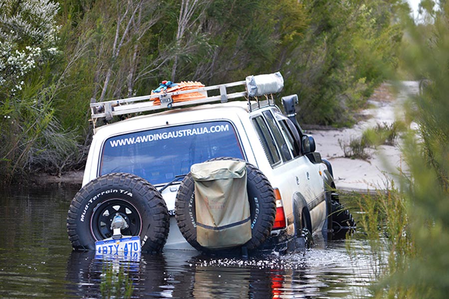 Toyota LandCruiser crossing water in Western Australia