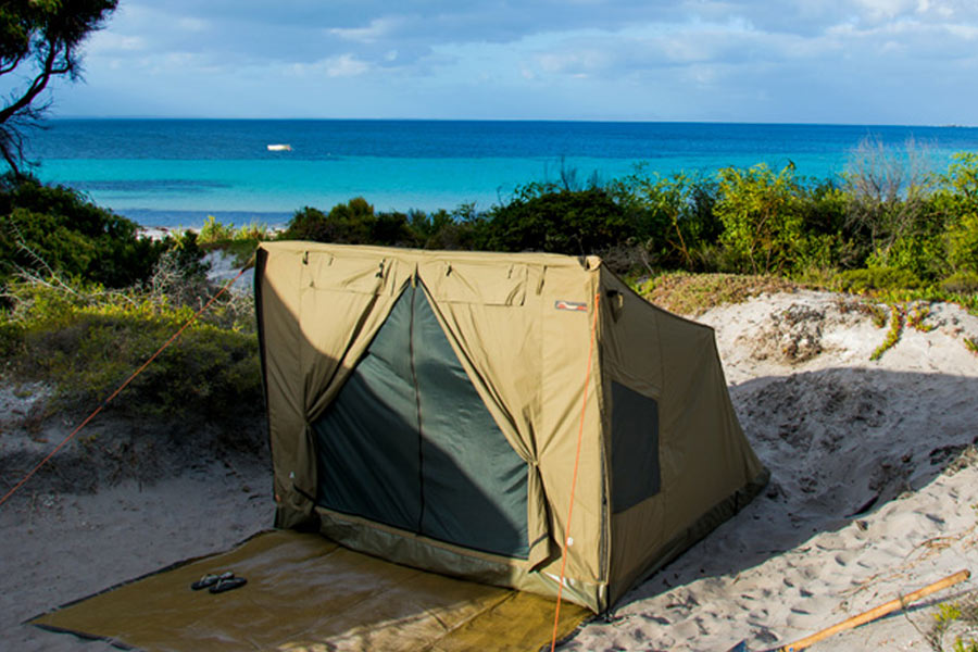 Oztent RV3 tent setup by the beach