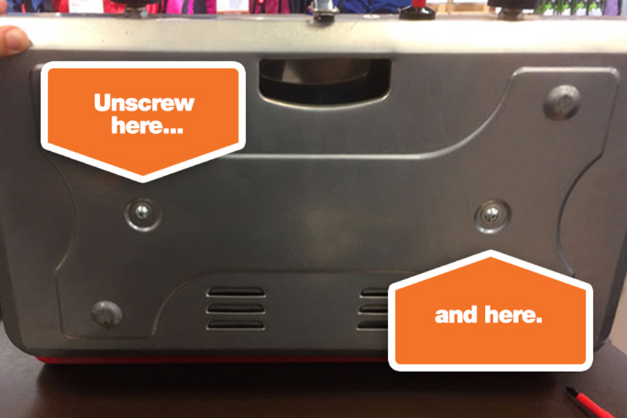 Step 2 - Flip the stove over and unscrew