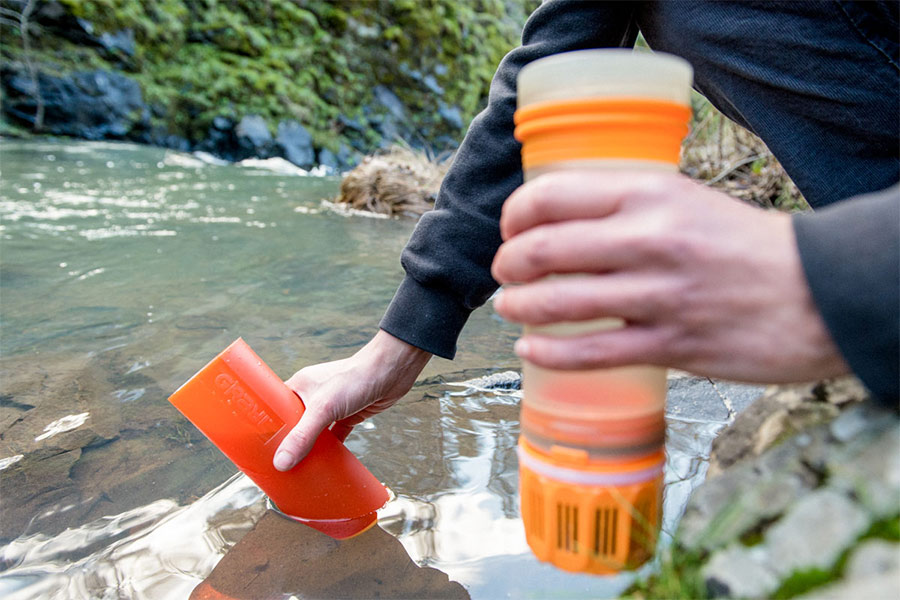 Filling up Garyl filter along a river