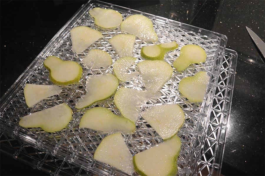 Sliced up pears on a tray