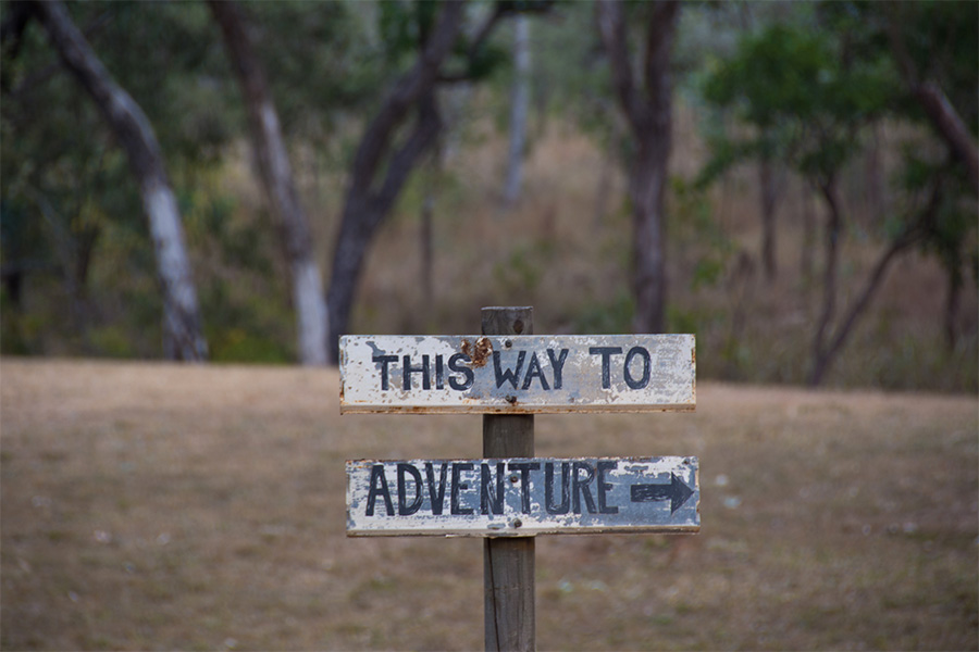 Sign saying 'this way to adventure' in Lorella Springs