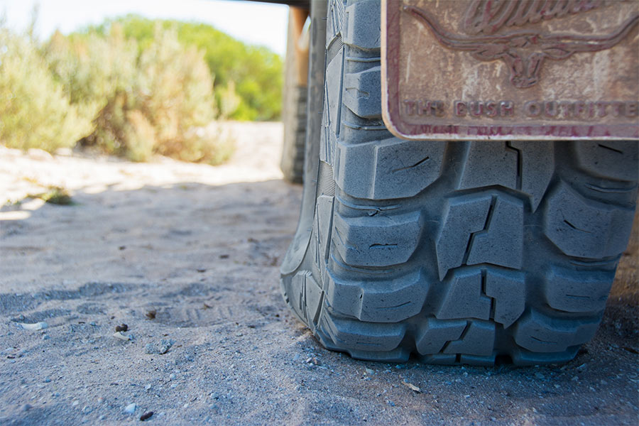 The grooves on a 4WD tyre representing how it aids in traction and flotation for the vehicle