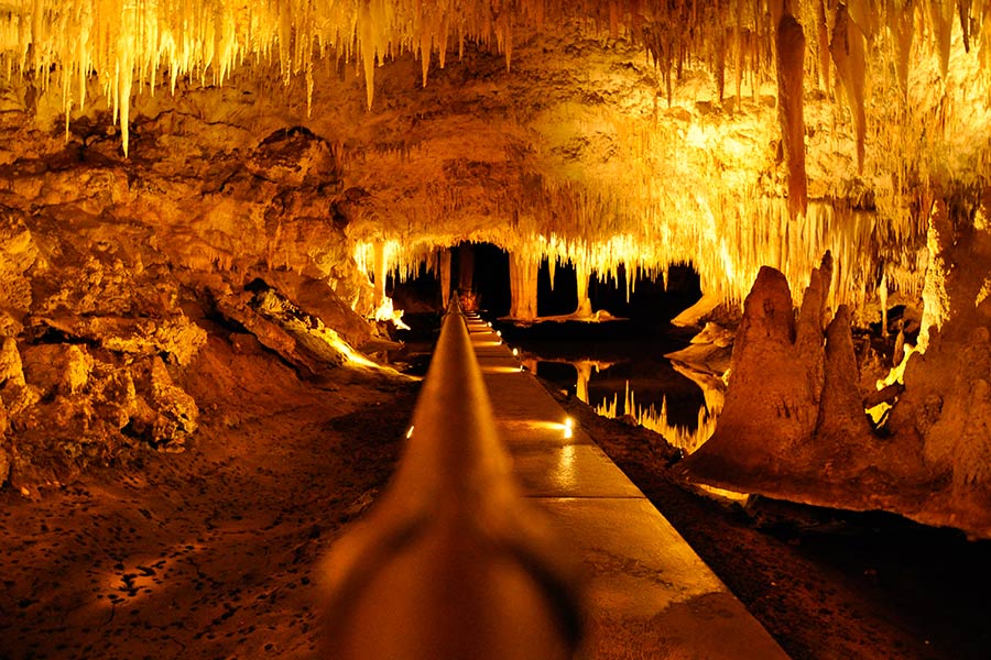 Magical golden glow inside Lake Cave in WA