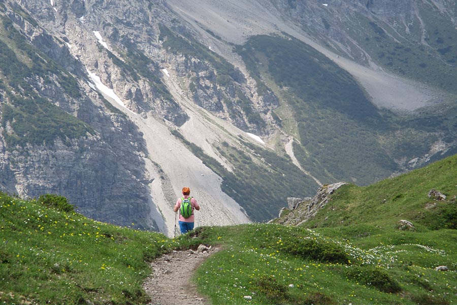 Man walking along terrain near Steinseehütte