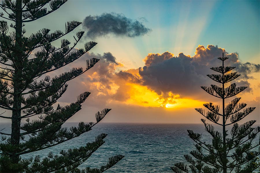 Beautiful sunset behind the ocean in Norfolk Island 