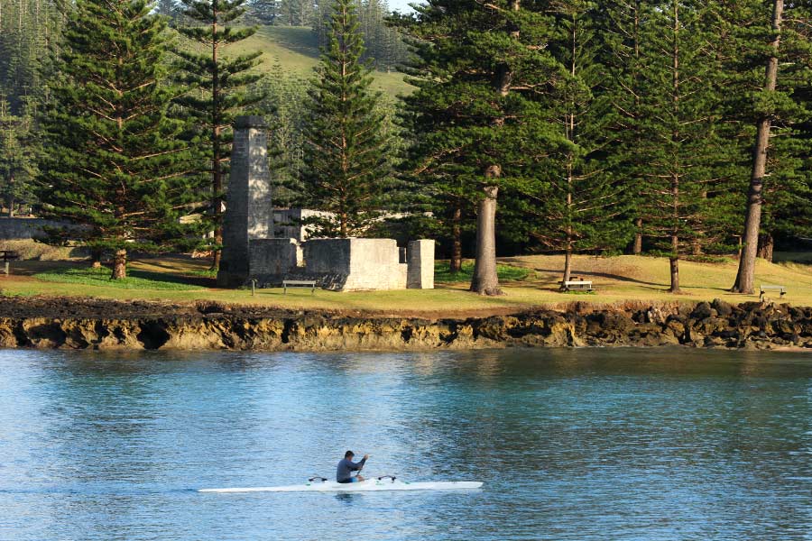 Man kayaking along water in Norfolk Island