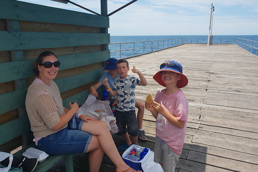Family eating fish and chips at Tumby Bay