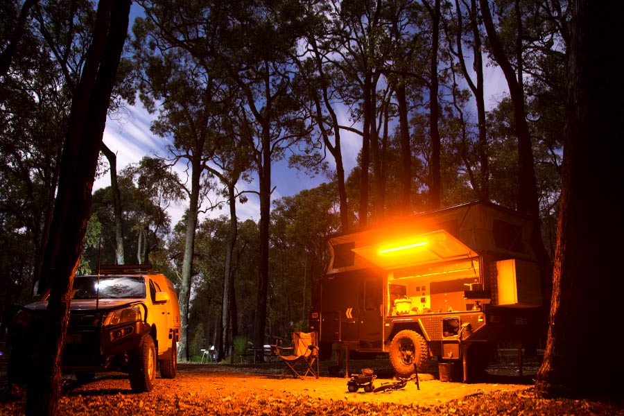 Camper trailer lighting at night in Perth