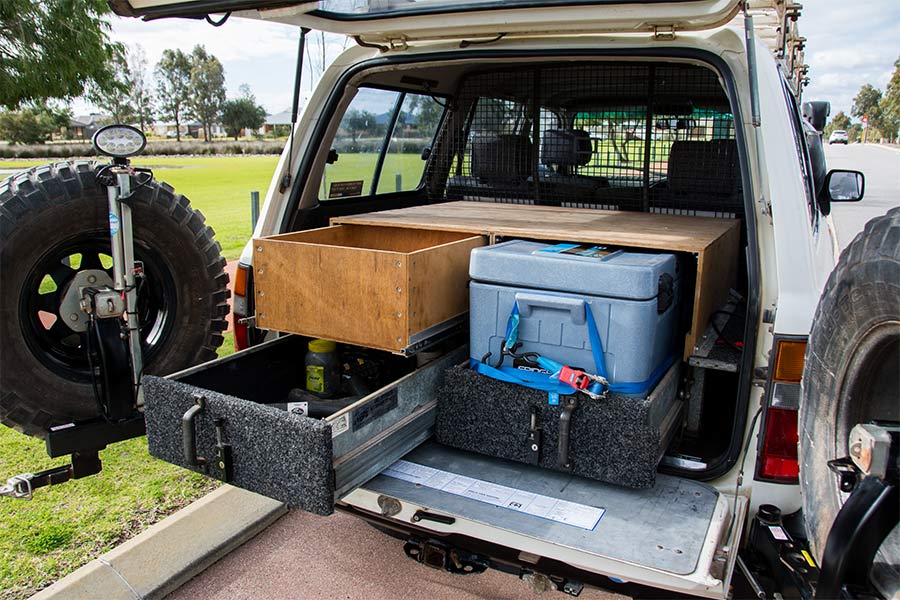 Drawers-and-a-cargo-barrier-in-a-4wd