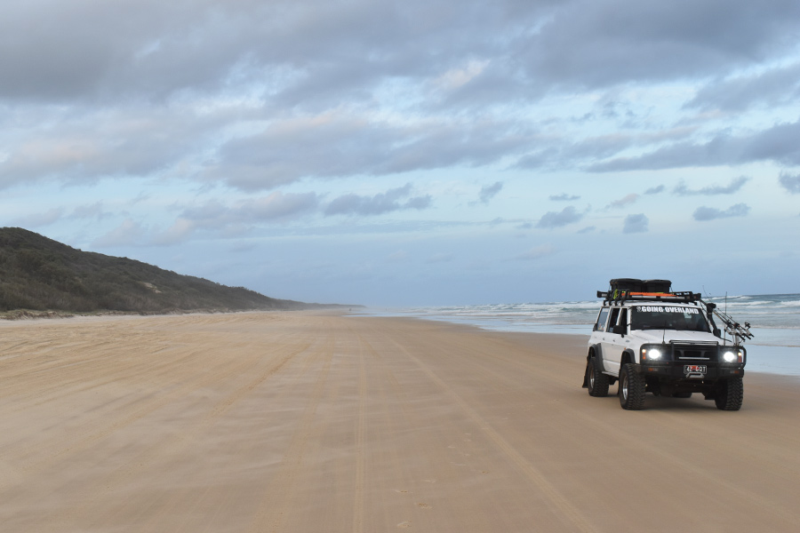 A 4wd driving on a beach