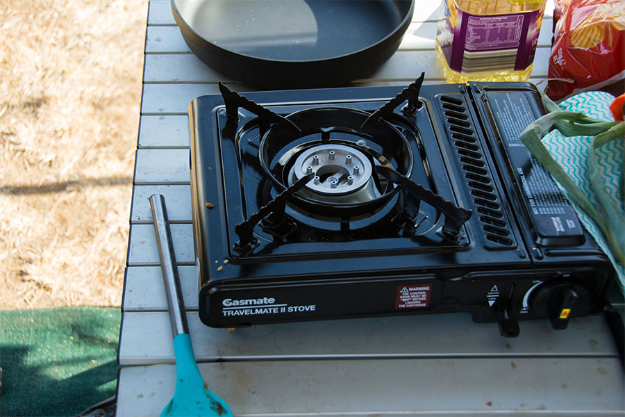 Stove sitting on camping table