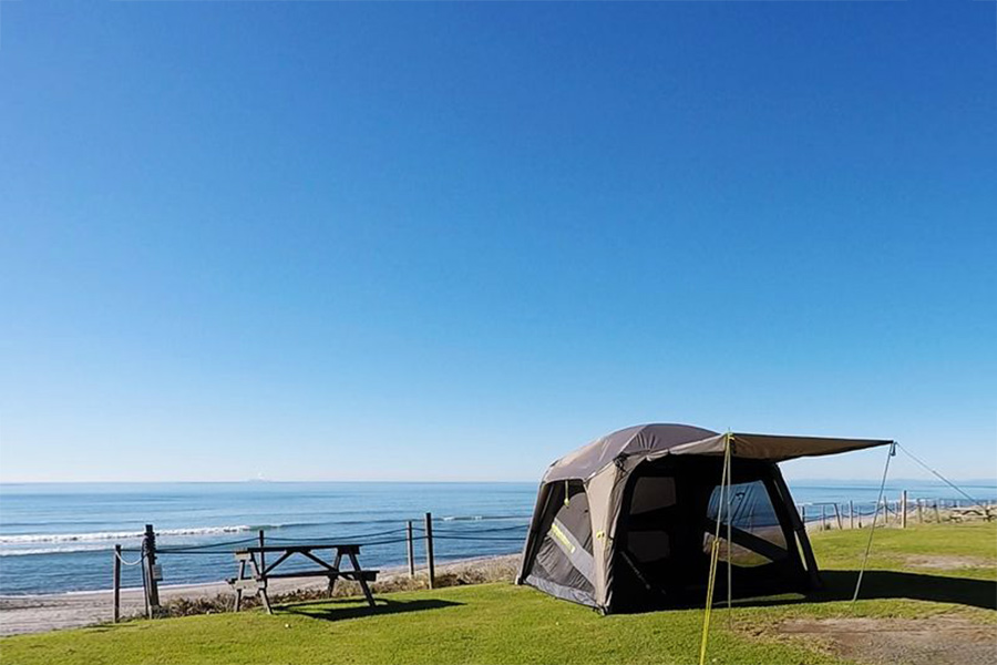 Zempire tent with TPU poles setup next to beach