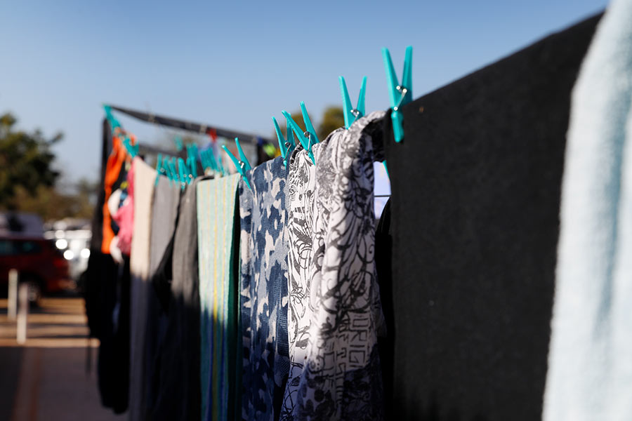 A close up photo of a full clothes line