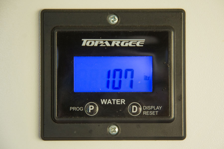 A flow meter gauge showing 107ltrs remaining