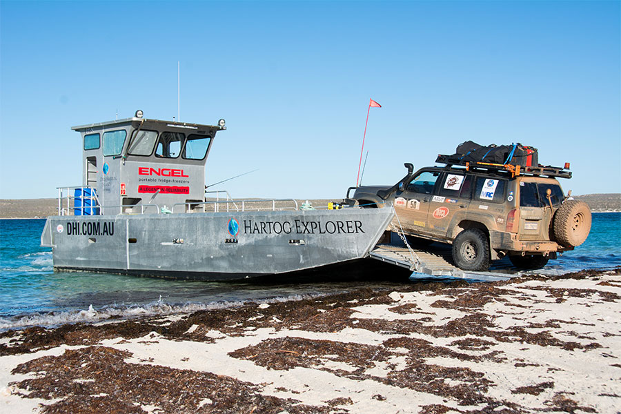 The Dirk Hartog Island barge loading a 4WD vehicle.