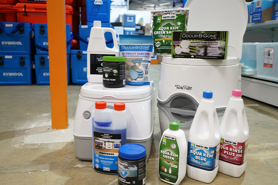 A merchandising shot showing the extensive range of chemicals available for portable toilets.