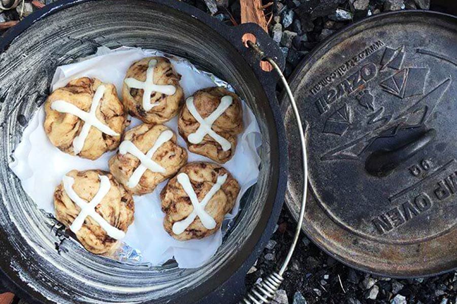 Hot cross buns in a camp oven