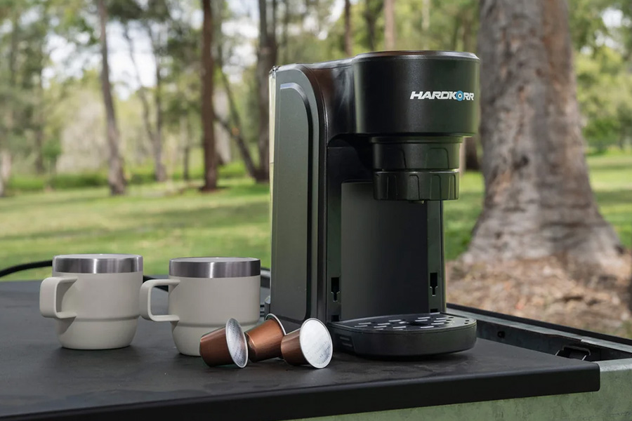 Snowys unplugged: our gear gurus go off-grid, and off-script! Picture of Hard Korr Coffee Pod Machine on a table outdoors
